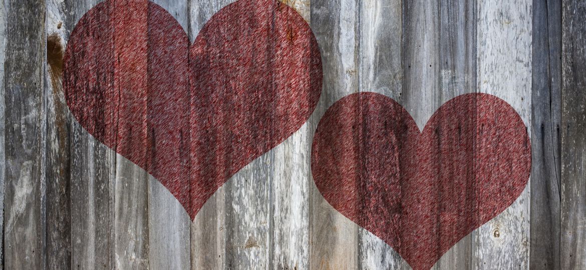 Love heart on vintage wood background texture